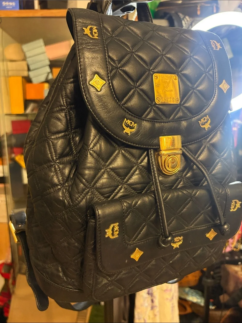 MCM Black Quilted Leather Backpack with Gold Accents